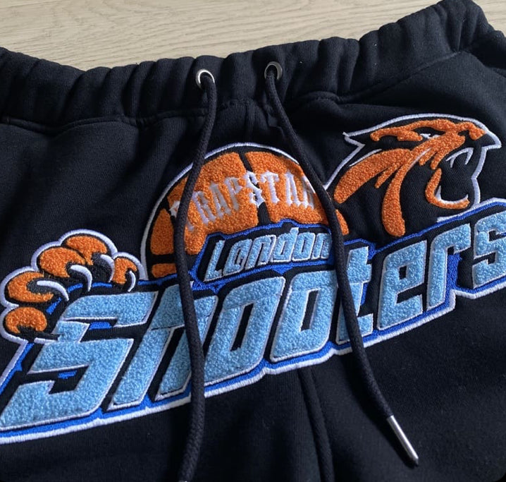 Conjunto Trapstar Shooters black Orange